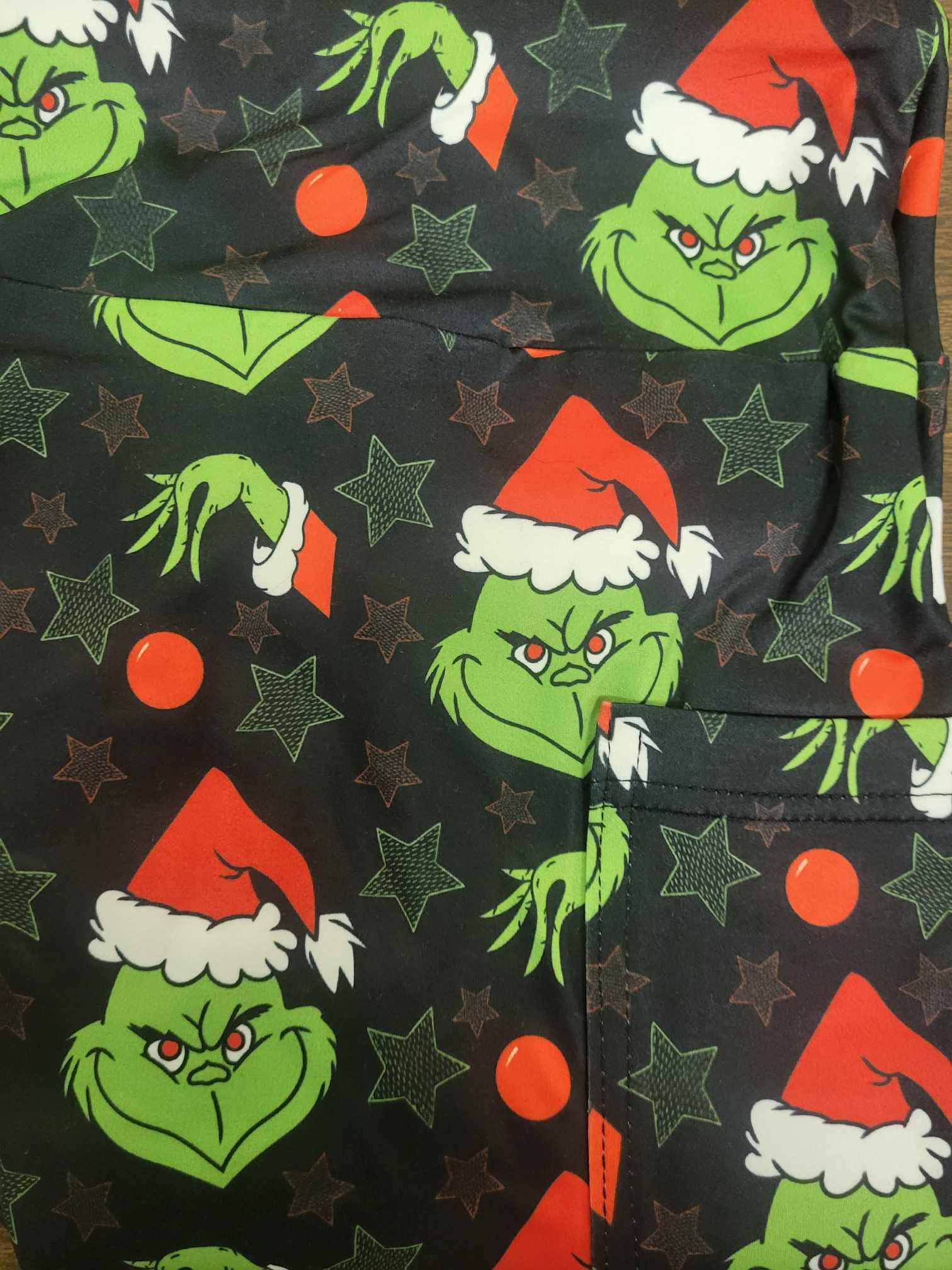 http://simplyscarvesandsuch.com/cdn/shop/files/grinch-leggings-with-pockets-simply-scarves-and-such-1.jpg?v=1706574434